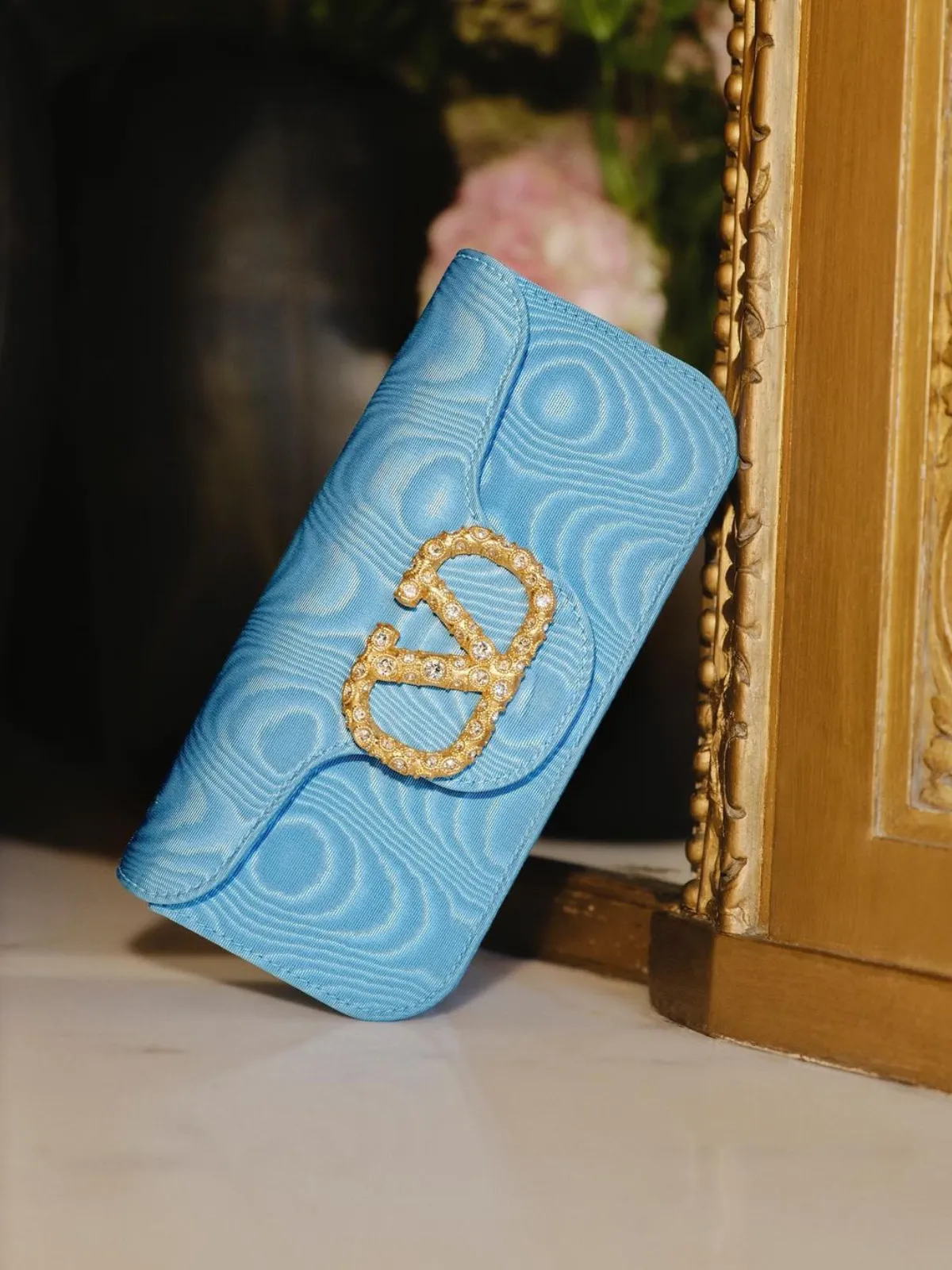 Blue Loc Moir Fabric Clutch with Jewel Logo