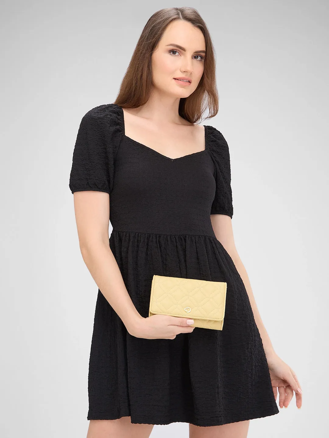 Caprese Berdine Large Light Yellow Flapover Wallet