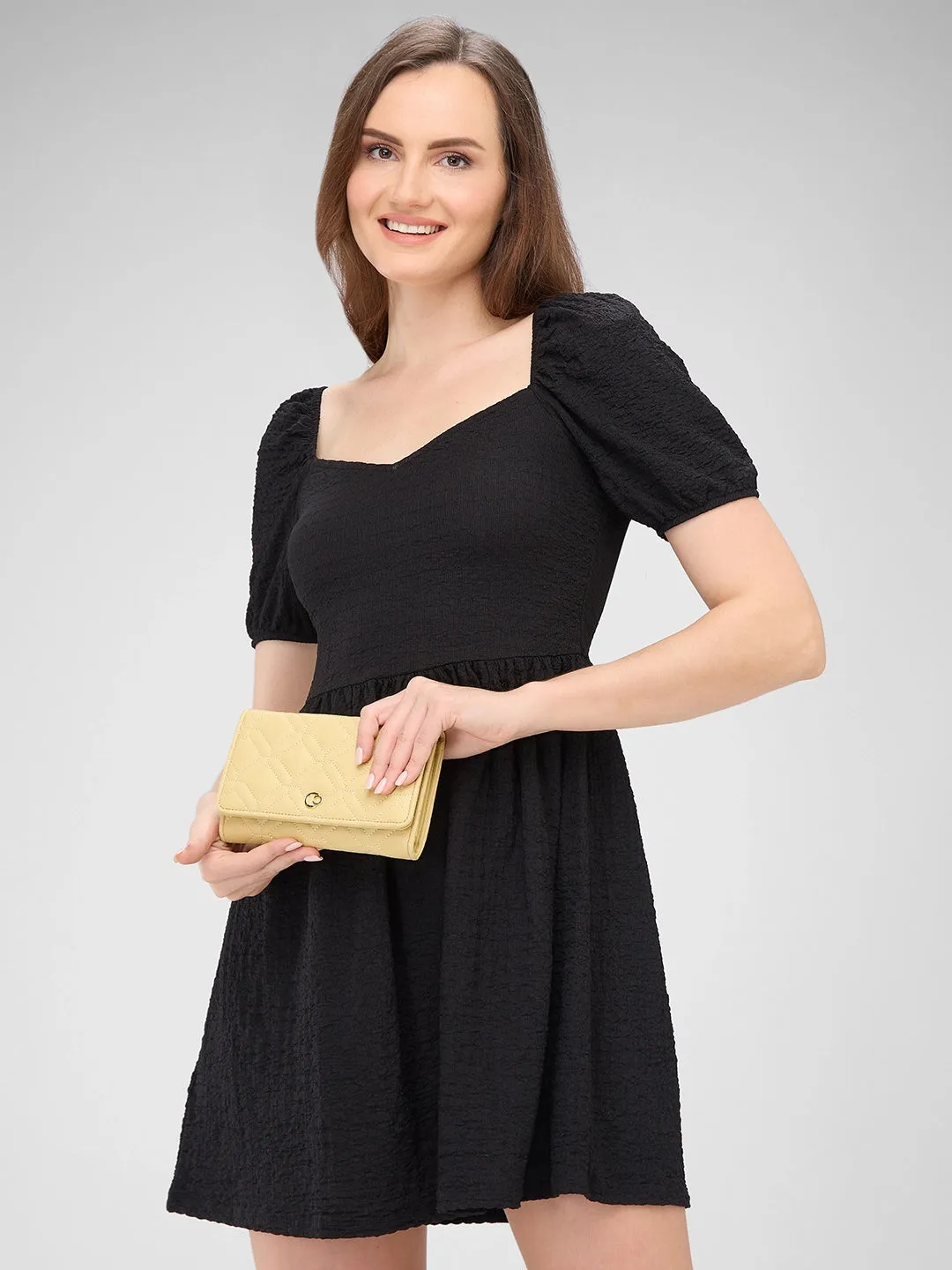 Caprese Berdine Large Light Yellow Flapover Wallet
