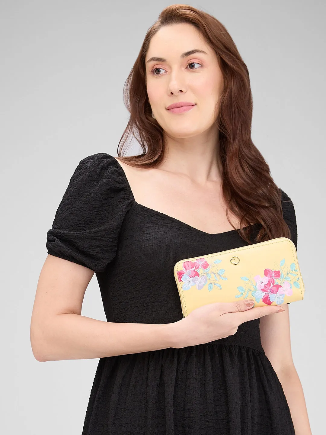 Caprese Shanaya Large Yellow Printed Zip Around Wallet